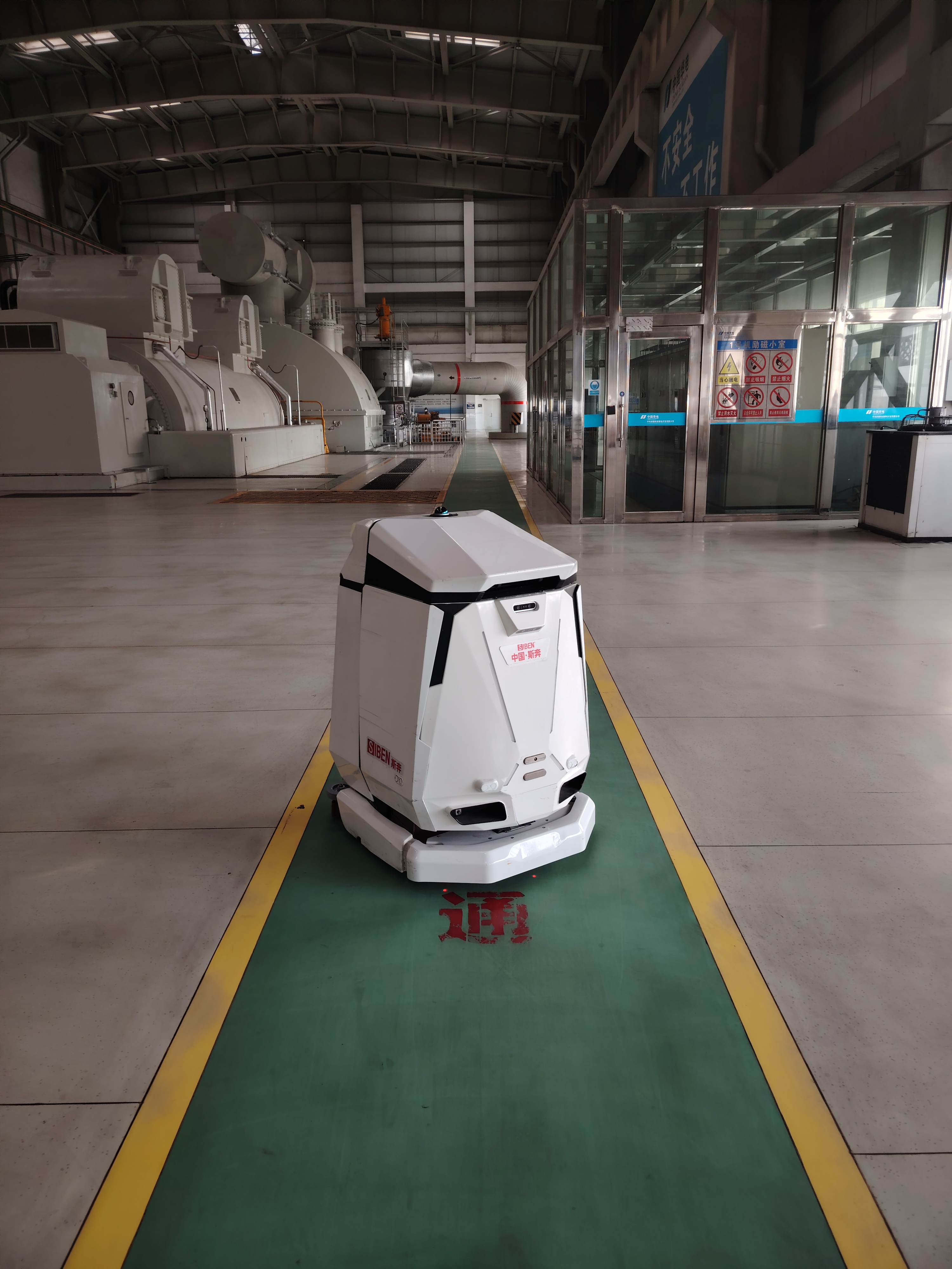 Siben Thunder God AMR Robot at Hami Coal Power Plant Siben Thunder God AMR cleaning robot deployed at Hami Coal Power Group industrial facility demonstrating manufacturing quality in real heavy-industry environment