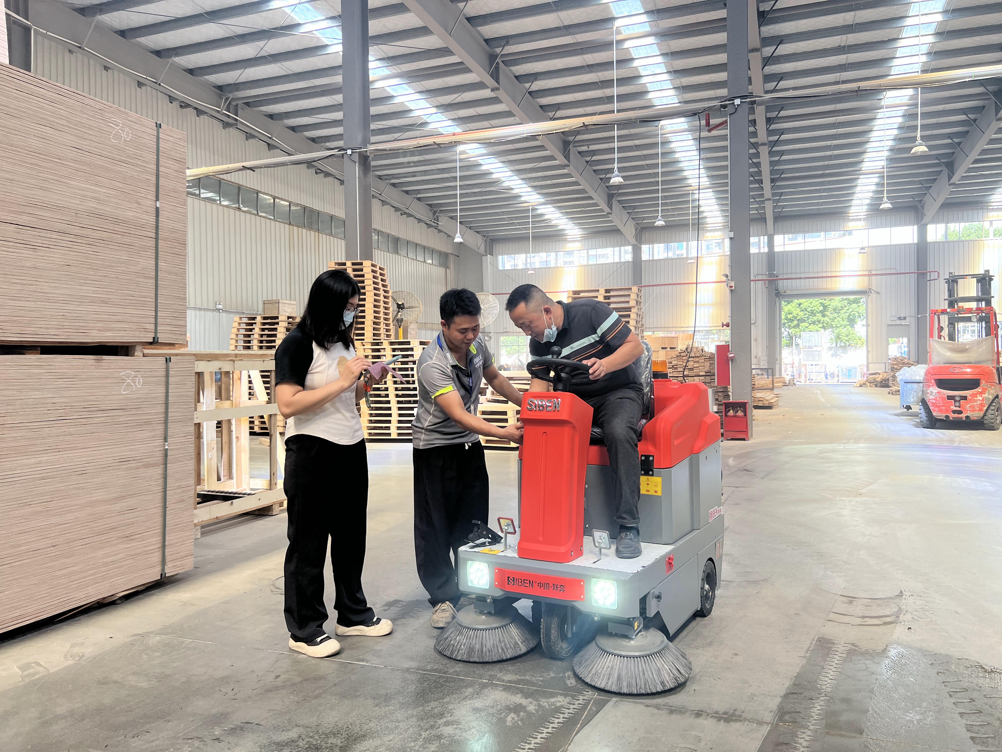 Siben A300 industrial sweeper cleaning a large factory hall floor removing dust and debris with 1150mm sweeping width and 5580 square meters per hour efficiency