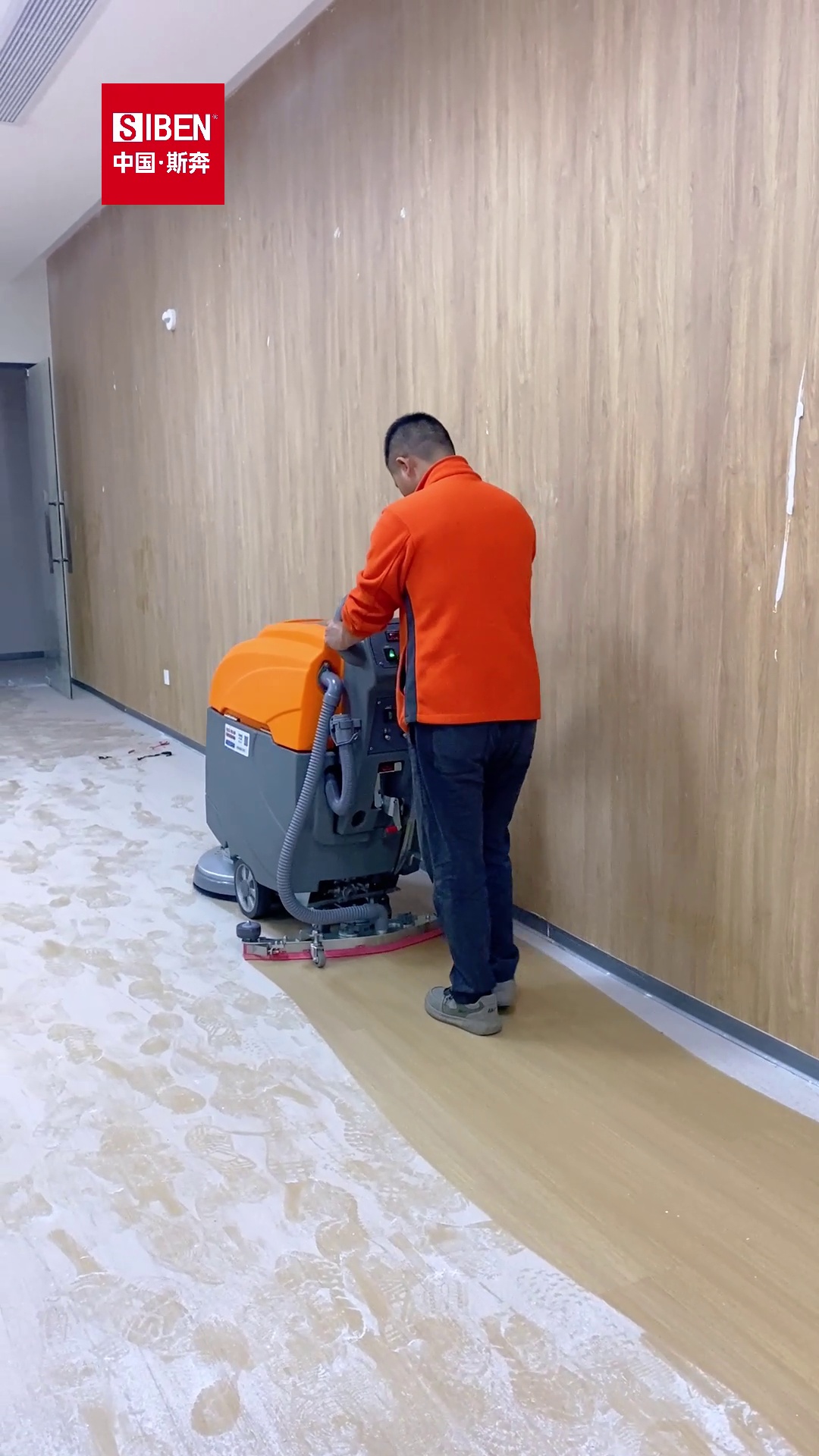 Siben X5S walk-behind scrubber cleaning school corridor